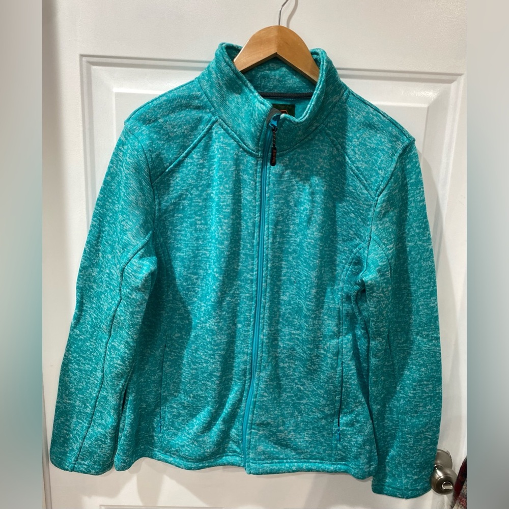Trail Crest women’s zip-up teal jacket trail bound